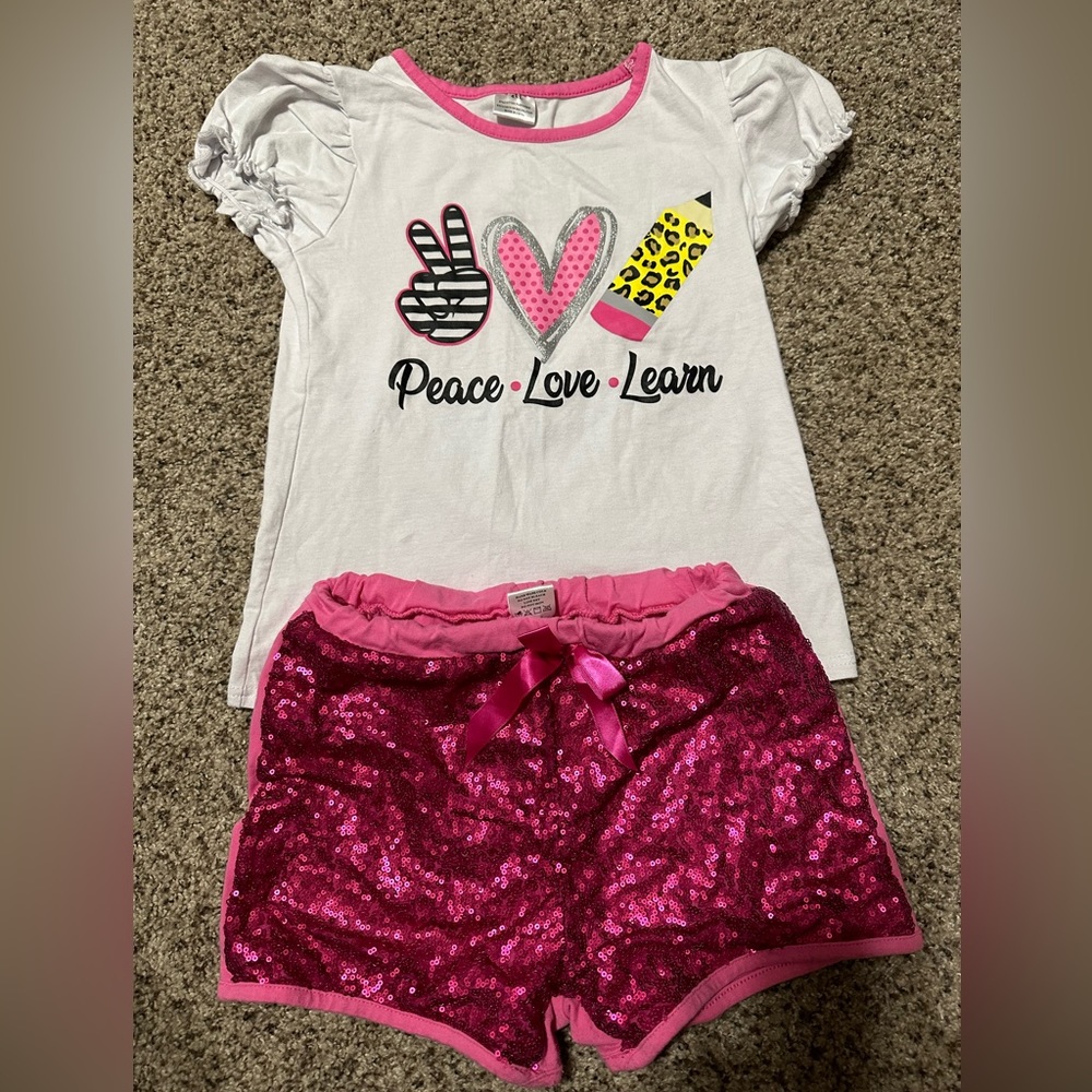 Back to school boutique outfit. Sequin shorts with ruffle sleeve top